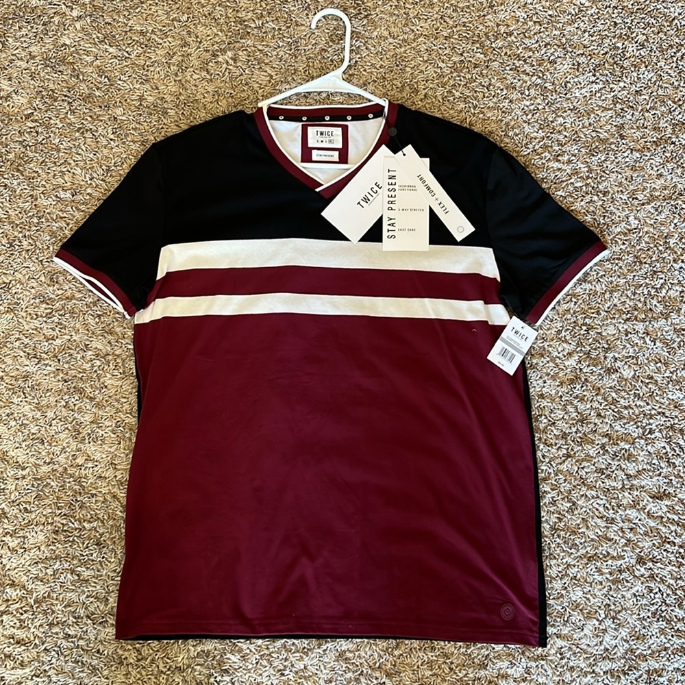 Black v-neck with burgundy and white accents